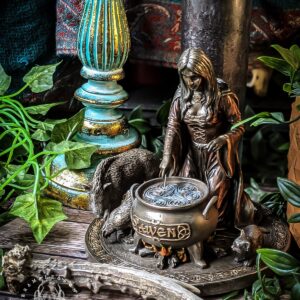 Honour the Welsh Goddess and Enchantress Ceridwen - or cerridwen -with this finely crafted statue. This statue features many of her key symbols from her mythos- the pig, cauldron, awen, hen and cat. Use this upon your shrine, or place on an altar for creativity, rebirth and inspiration. Cast in bronze polyresin, this statue is a beautiful depiction of the mighty enchantress. Once you’ve received the statue- make sure to ‘awaken’ the statue in any way you see fit. This could be through annointing oil, sacred incense blends or through using a light wash. We suggest an offering incense to welcome in the spirit. This statue is hand painted resin with a bronze finish. It stands at 17cm. To see how people use these in action, visit our Instagram Page. If you want to learn more about our products, go to our ‘Learn More’ Page.