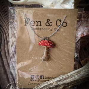 Connect to the spirit of the Fly Agaric with this Fly Agaric Necklace by Fen & Co. Fly Agaric is the plant of Spirit Flight, Poison, Witchcraft and the Otherworld. This necklace has been upcycled from restored antique mushroom images, printed on to 4mm thick sustainably grown Birch Wood. Each piece takes three days to complete. Each necklace is finished by hand with a luxurious gloss sealant.